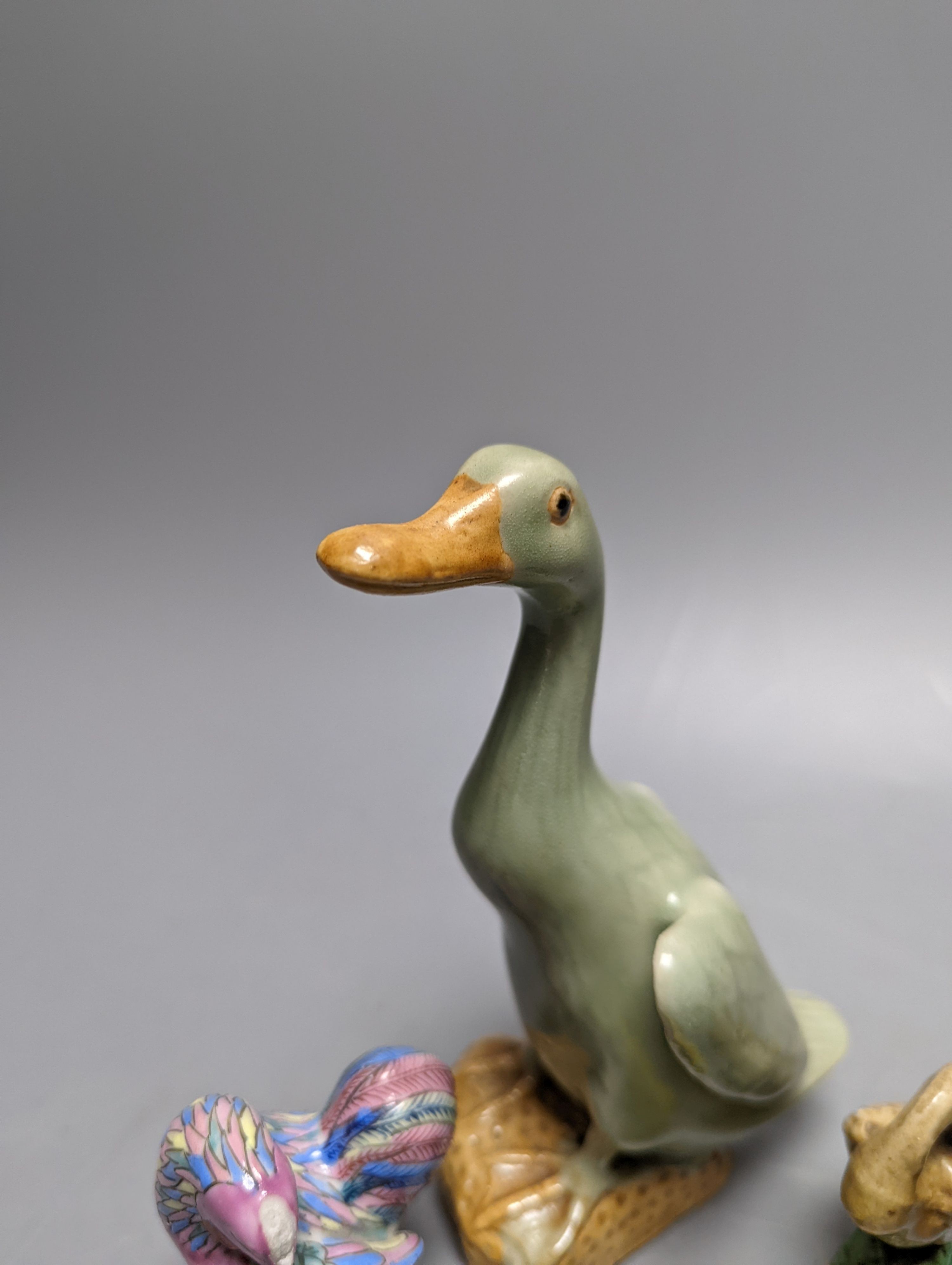 Seven Chinese ceramic ducks and a cockerel 15cm